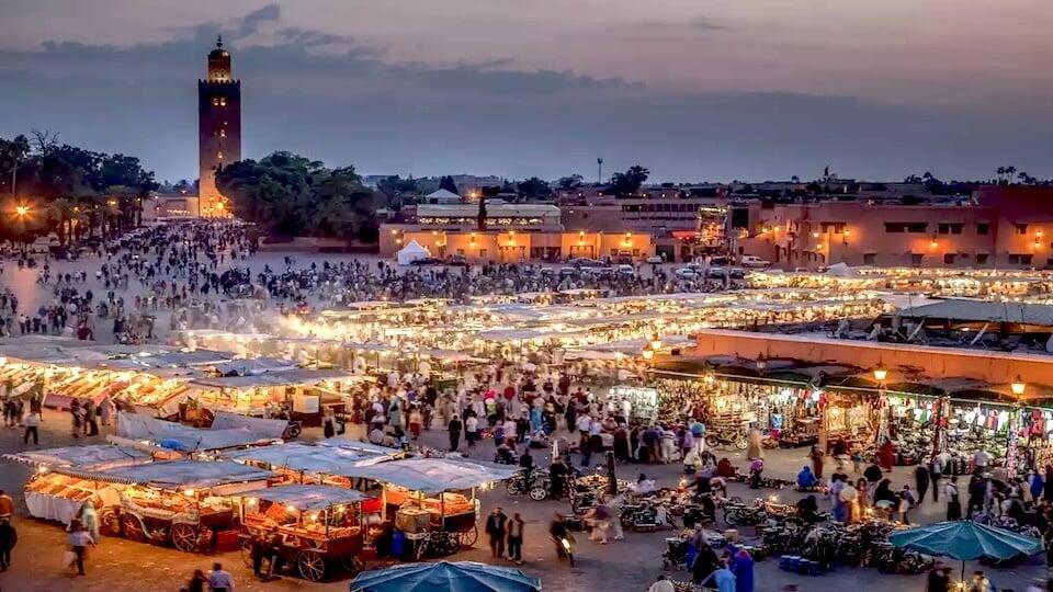 Jemaa el-Fna square at sunset — Marrakech's central UNESCO-listed gathering place